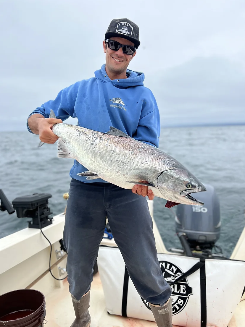 Captain Chris with a smile and an excellent catch